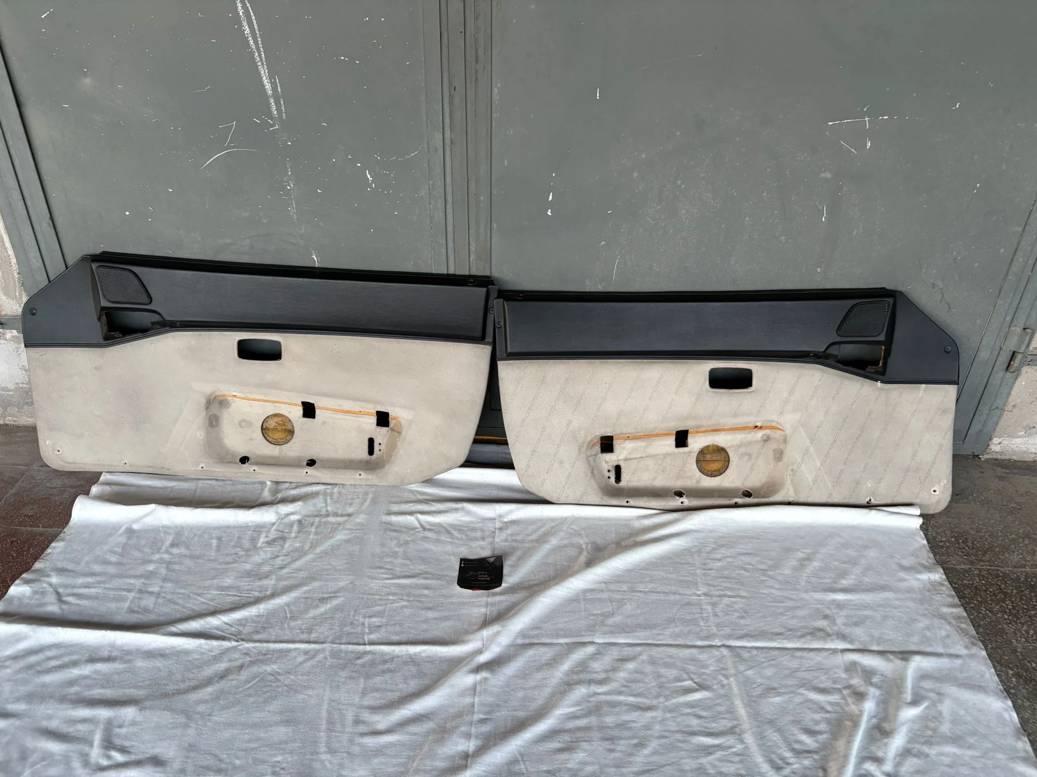 Pair Of Porsche 944 black/cream Porsche scripted fabric door cards 94455501701 / 94455501801 used, very nice condition with M651 sound pack - Image 2