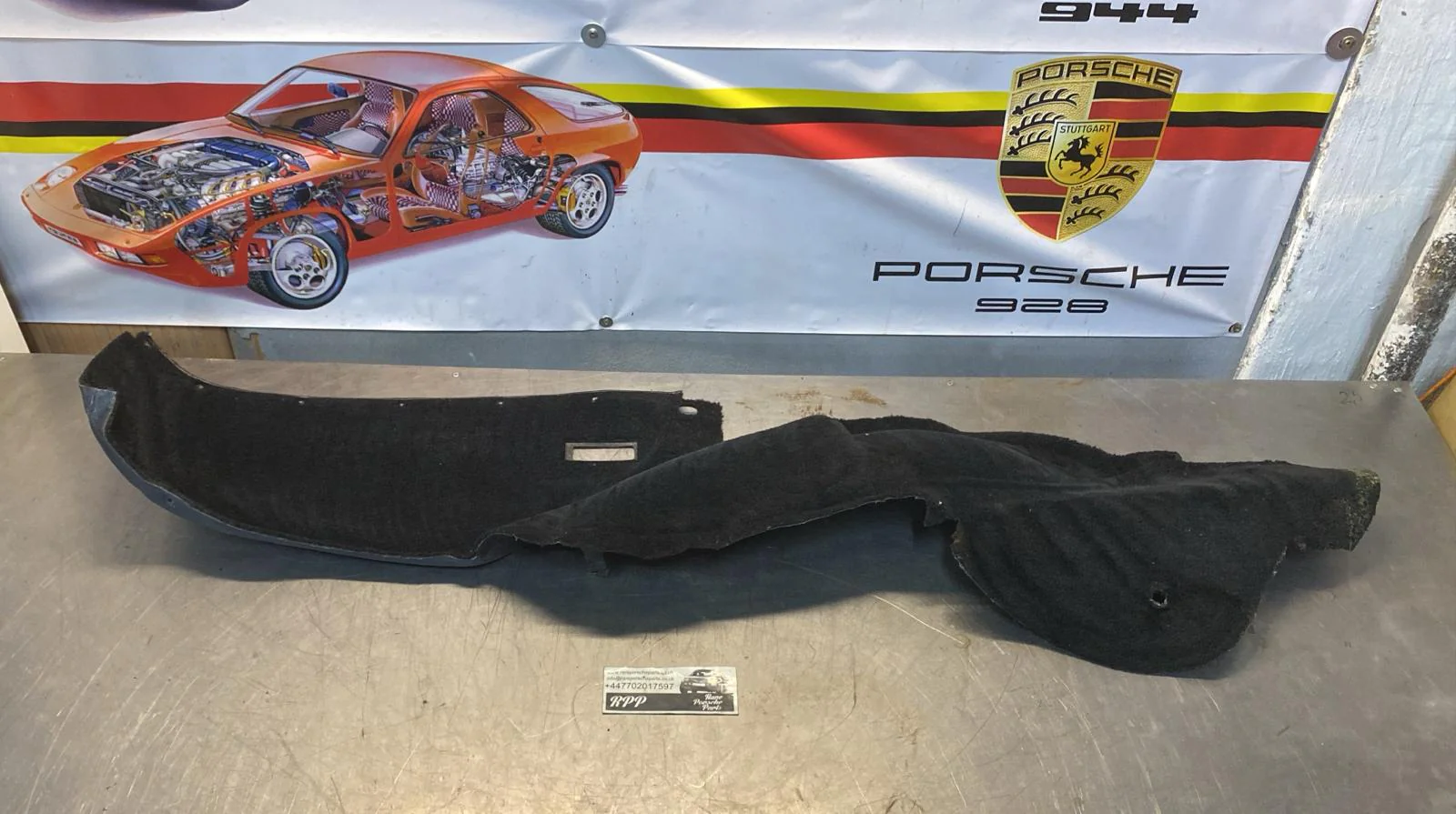 Porsche 924/944 85.5- rear left side trim carpet, black, 94455508301, used