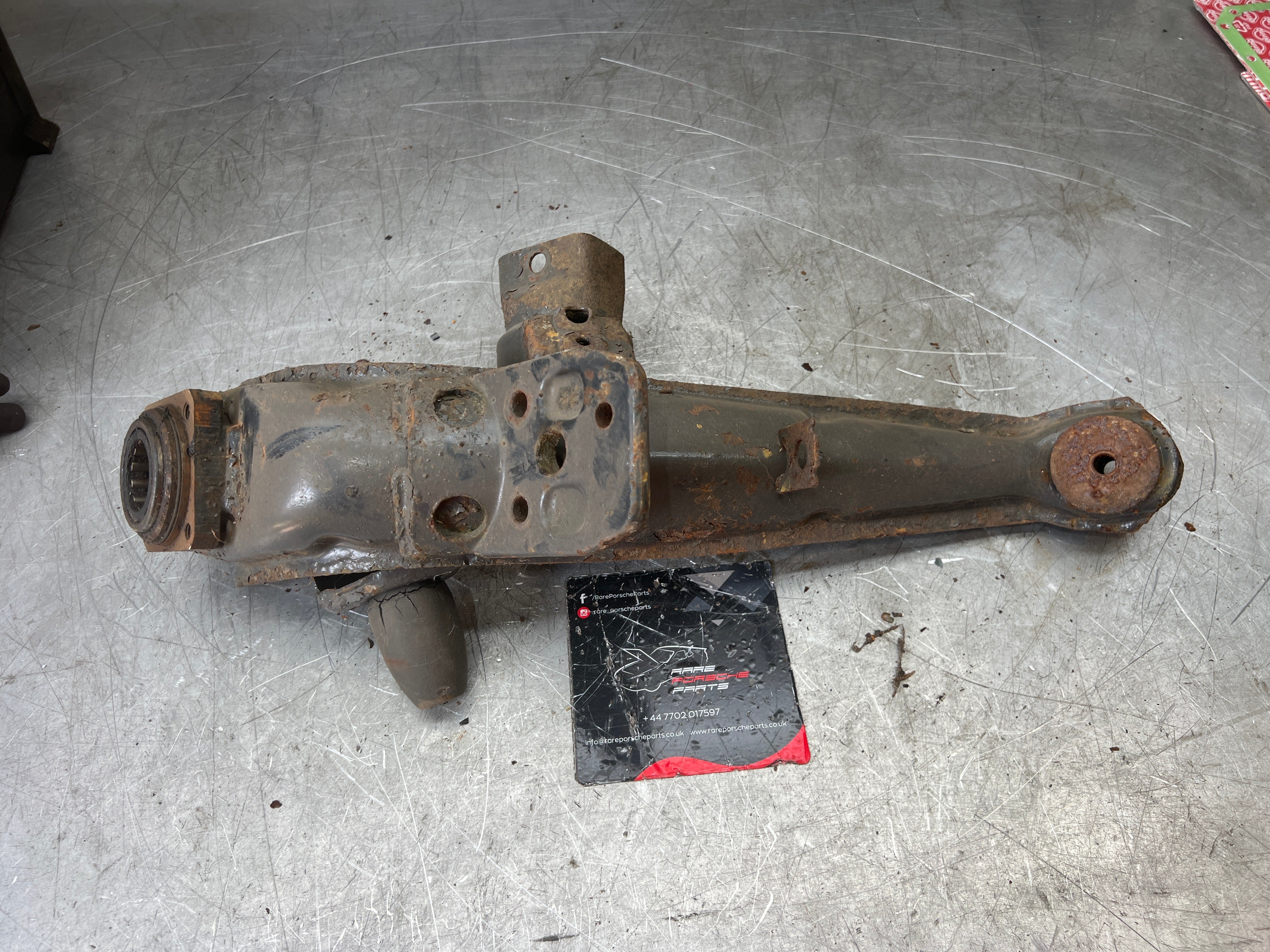 Porsche 924 944 -85.5 Rear left trailing arm, 94433102100