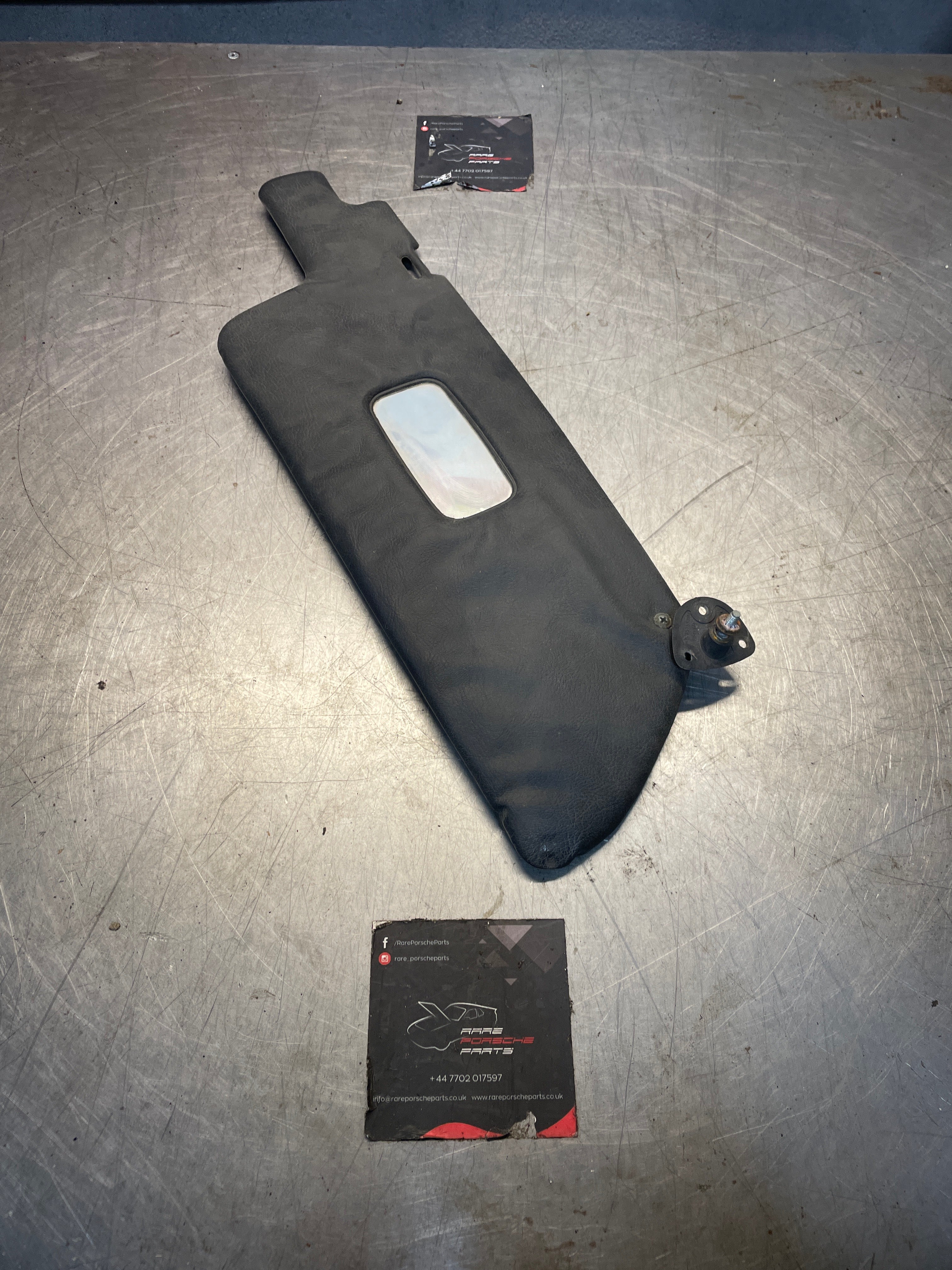 Porsche 924 944 right passenger side sun visor with mirror, black, used 477857552C