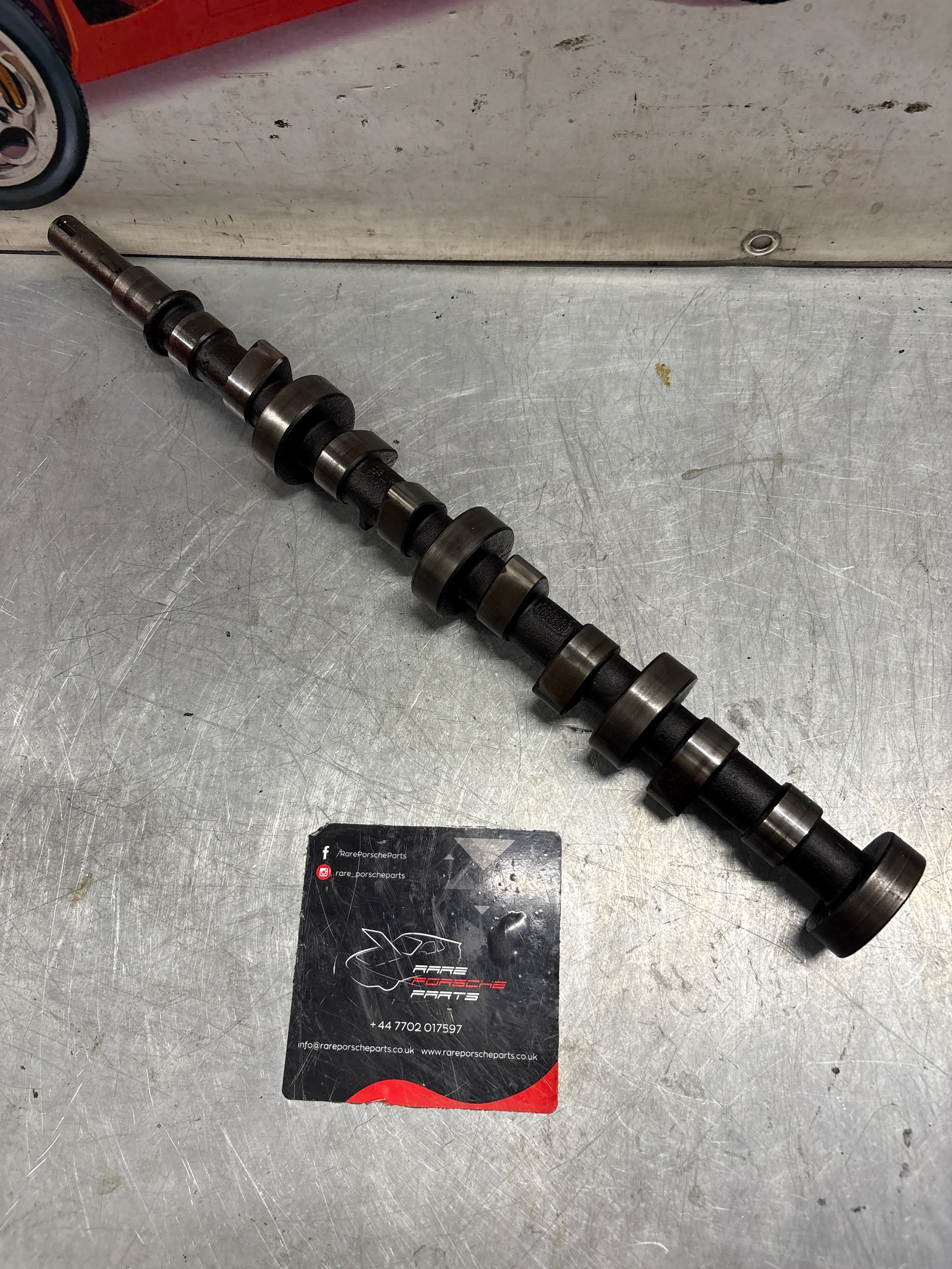 Porsche 928 cam shaft, used 9281051870R - Image 2