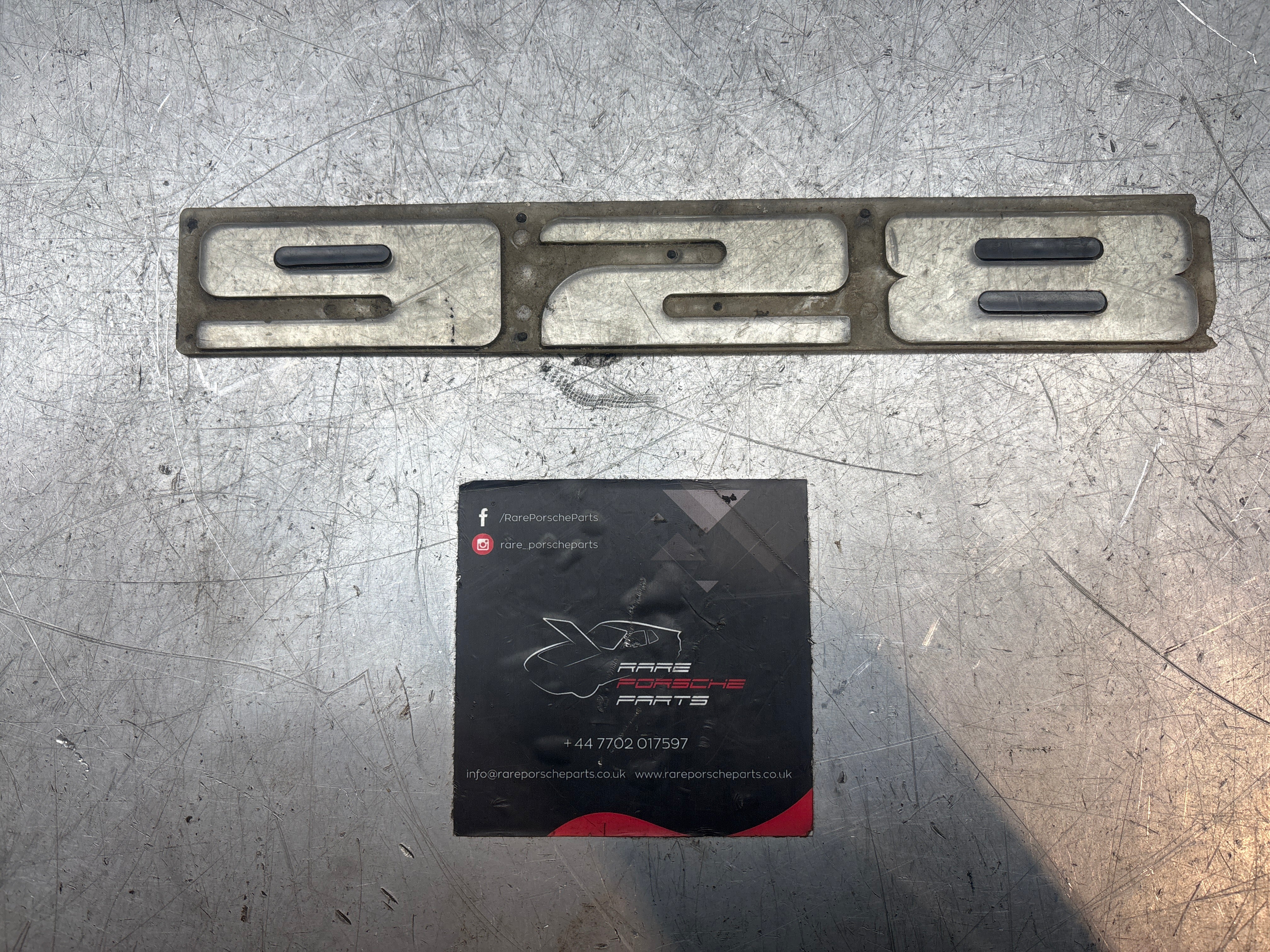 Porsche 928 scuff plate, door sill trim insert 92855105502 used
