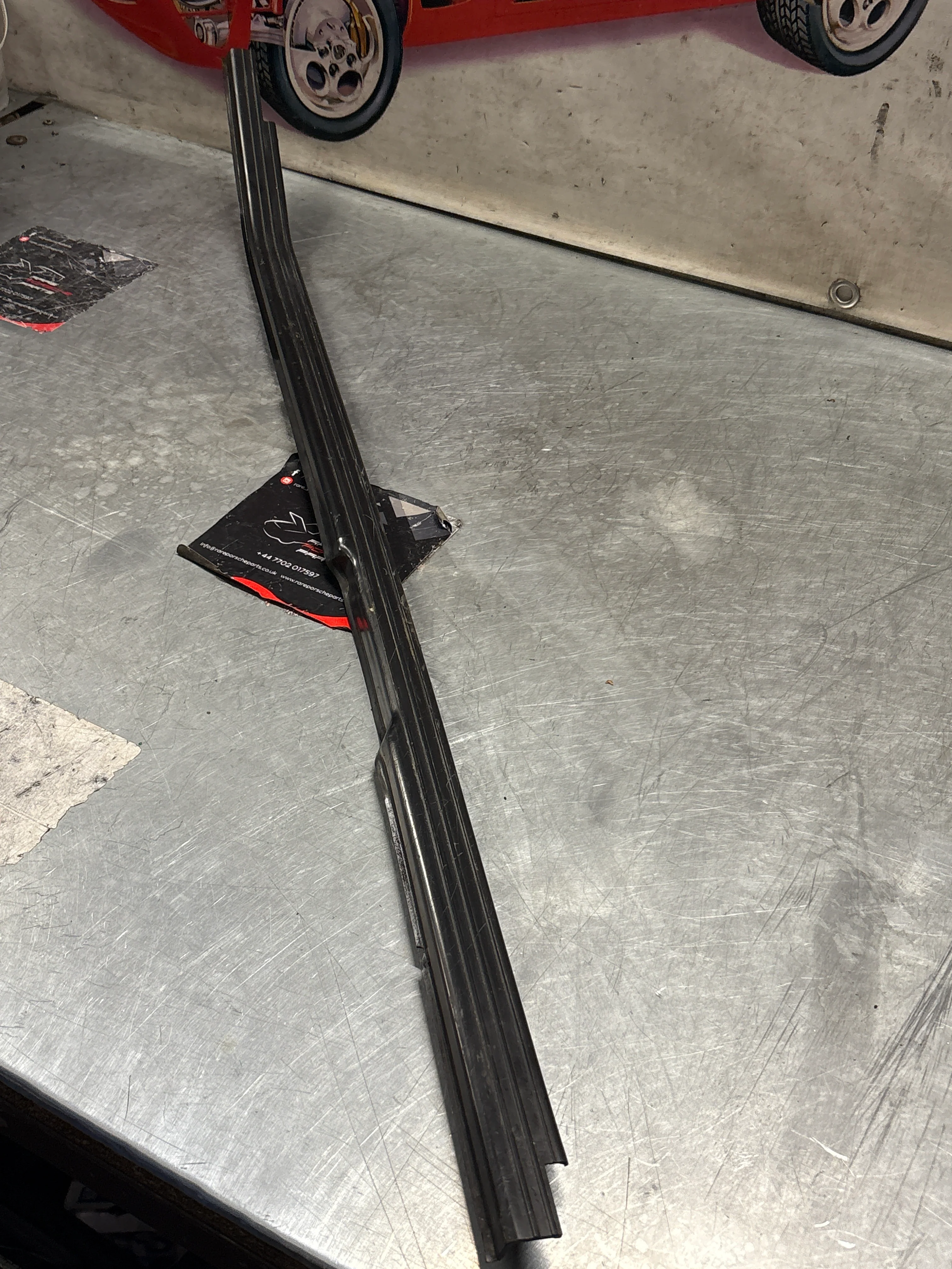 Porsche 944 85.5- left sill trim, scuff plate used 94455112100 cracked - Image 2