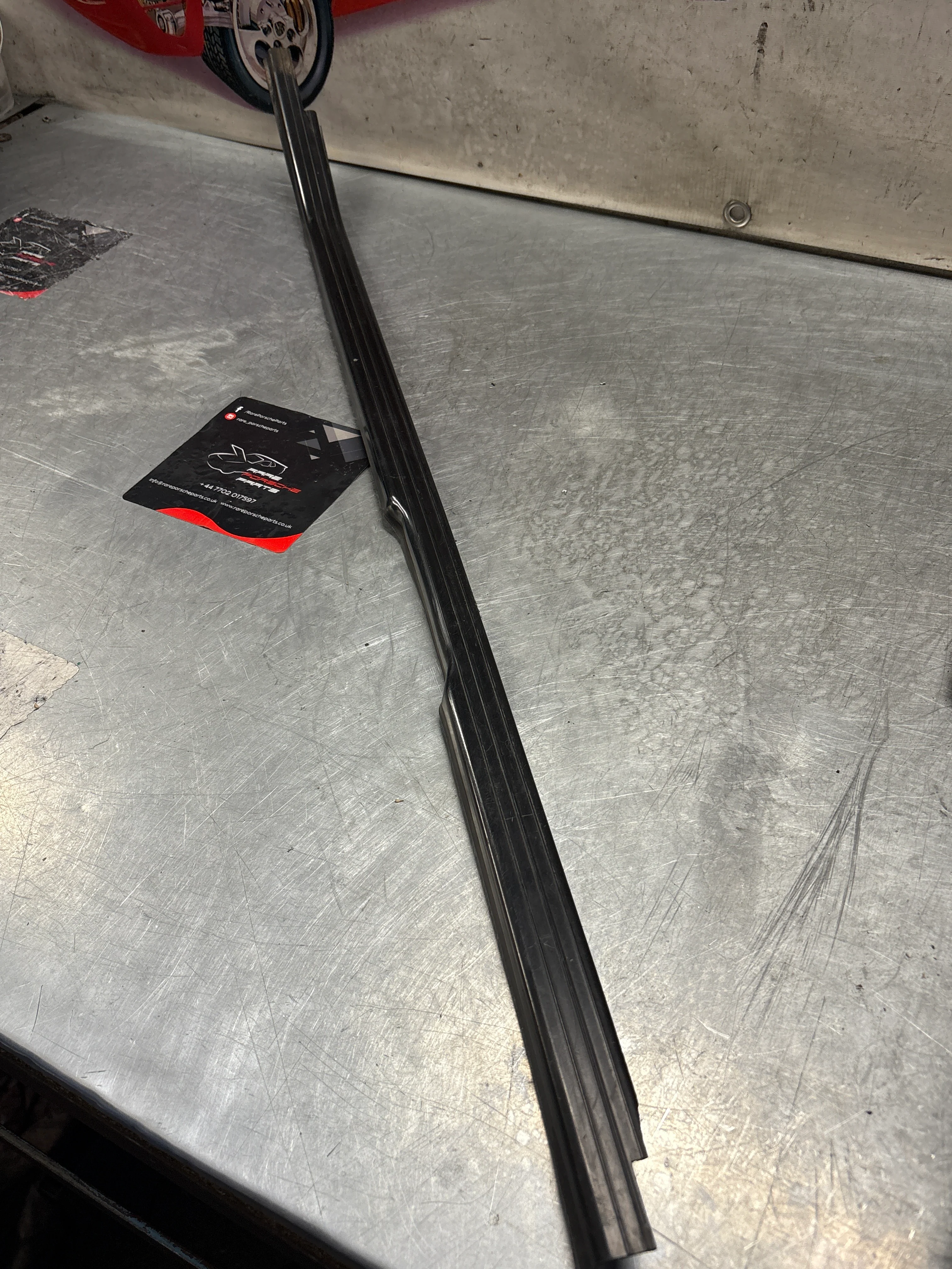 Porsche 944 85.5- left sill trim, scuff plate used 94455112100 cracked - Image 2