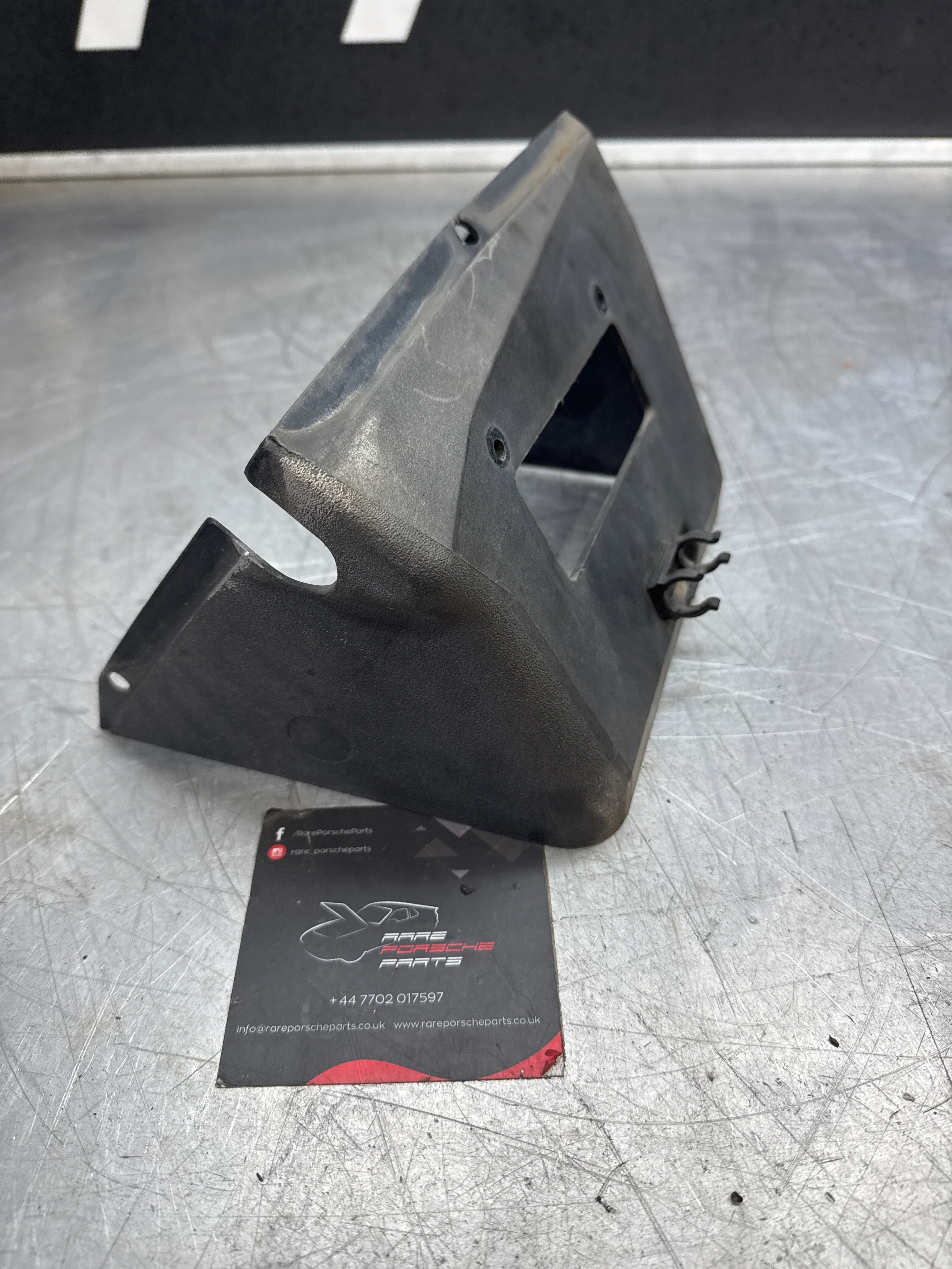 Porsche 944/924 right headlight lower surround shield 477805632 used - Image 4