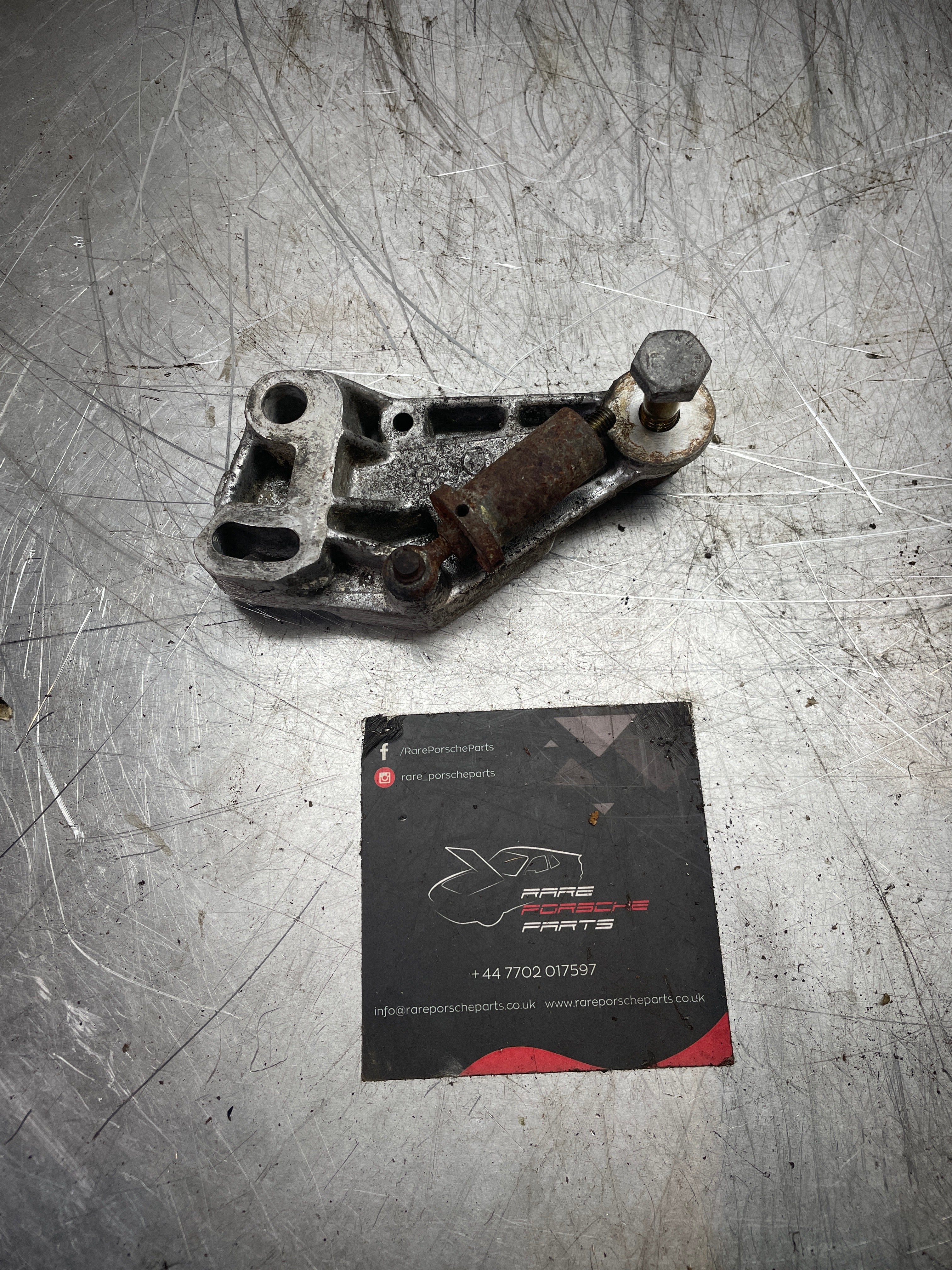 Porsche 944 timing belt tensioner bracket, used 9441056117R 94410561107 - Image 2